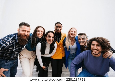 Selfie photo with multiracial group of friends enjoying stay together.
