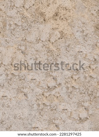 Textured, warm toned, natural marble stone surface and background	