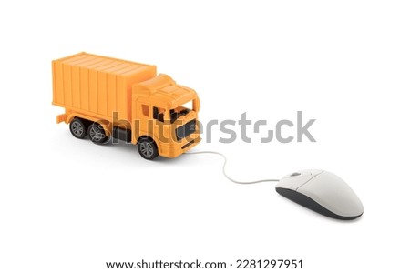 Yellow cargo delivery truck miniature connected to computer mouse on white background