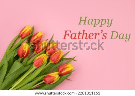 Card with the inscription Happy Fathers Day with tulips on a pink background.Concept holiday, congratulation, design, gift, discounts, party, day off, family,text, moc-up, copy space,celebration,love. Royalty-Free Stock Photo #2281311161