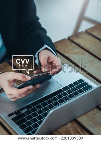 CVV code in speech bubble appears while businesswoman using smart phone and credit or debit card, paying for shopping online, vertical. Secure payment, safety banking transaction mobile application. Royalty-Free Stock Photo #2281339389