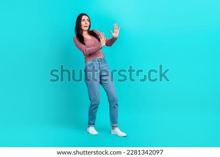 Full body size cadre of young unhappy angry woman hands show stop symbol scared nervous panic stop bad news isolated on cyan color background Royalty-Free Stock Photo #2281342097