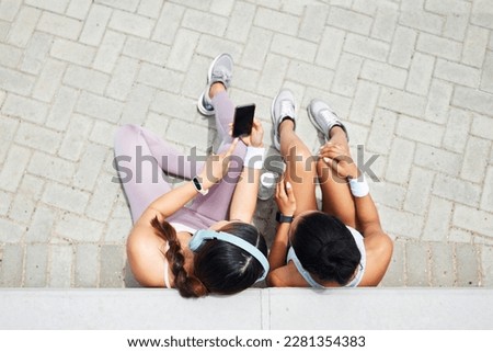 Smartphone, headphones and fitness friends listening to music, exercise podcast and health app for outdoor motivation. Relax sports people using phone for social media workout tips or blog app above