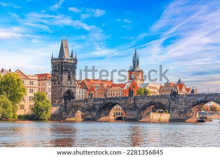 Prague - Charles bridge, Czech Republic. Scenic aerial sunset on the architecture of the Old Town Pier and Charles Bridge over the Vltava River in Prague, Czech Republic. Royalty-Free Stock Photo #2281356845