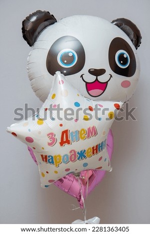 balloons panda, star and heart, the inscription on the balloon "Happy birthday"