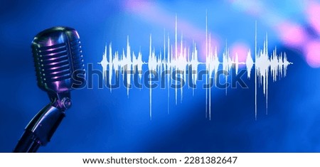 Vintage vocal microphone in the dark with blue lighting and a wave which represents the sound signal of the voice. Music, radio broadcast or podacast banner background with copy space.