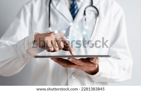 Doctor holding virtual human brain, idea creative intelligence thinking or Awareness of Alzheimer, Parkinson's disease, dementia, stroke, seizure or mental health. Neurology and Psychology care. Royalty-Free Stock Photo #2281383845