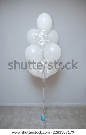 white and blue balloons and balloon boy on a white background