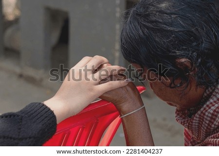 Beautiful Young Lady Praying For Old Lady in the Rural Area Village, Concept Picture of a Faithful Christianity.