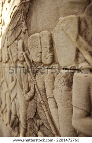 Soldiers carved on the walls of Bayon Temple, Cambodia