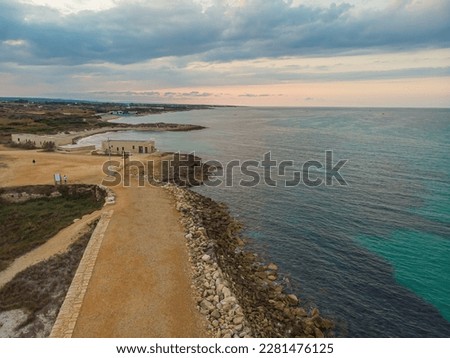 Zenith view of the seacoast around Torre Guaceto in Puglia, Italy. The shot enhances the layers of the morphlogy of the ground and the colors of nature typical of this area.