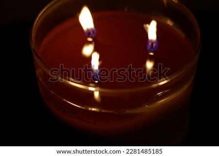 Candle Light Burning at Night 