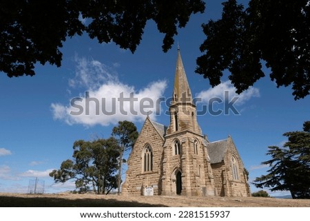 Gothic style stone Uniting Church (originally a Primitive Methodist Church) in Ross, Tasmania, Australia. Built about 1885 Royalty-Free Stock Photo #2281515937