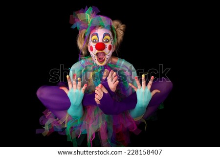 A colorful clown is floating in the air