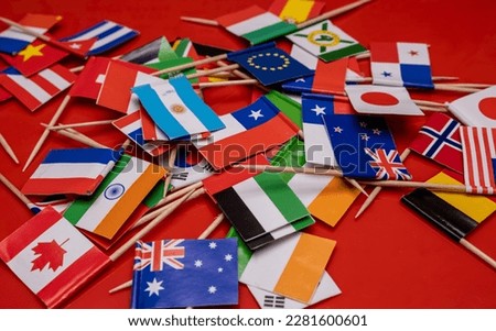 Small flags of different countries in close-up.