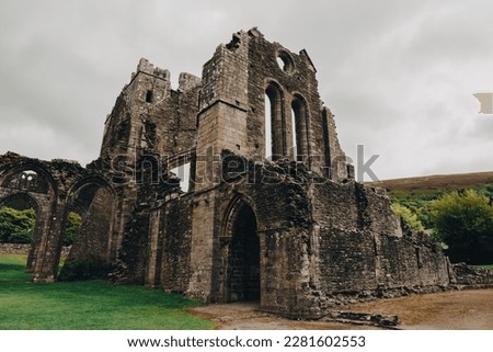 Llanthony Priory. Medieval castle ruin.  Beautiful medieval castle. Ruins of an old rural church. Llanthony Prior Abbey, Brecon Beacons, Mid Wales, UK. Landmarks of Wales travel concept. Royalty-Free Stock Photo #2281602553