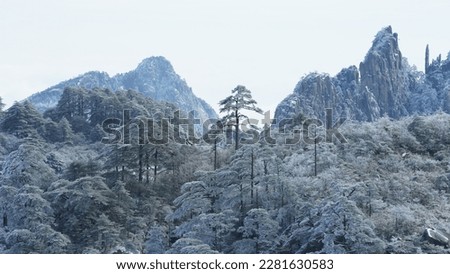 The beautiful frozen mountains view coverd by the white snow and ice in winter