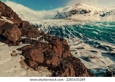 Amazing old glacier landscape photo. Beautiful nature scenery photography with rocky mountains on background. Idyllic scene. High quality picture for wallpaper, travel blog, magazine, article