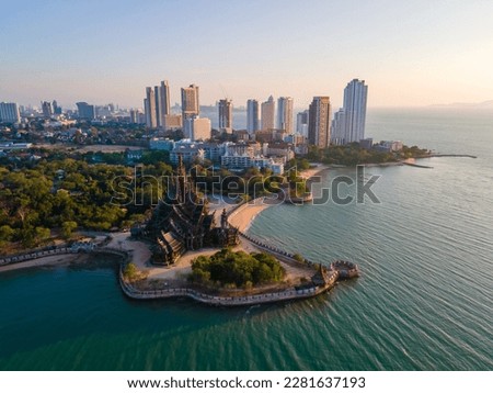 Sanctuary of Truth, Pattaya, Thailand, wooden temple by the ocean during sunset on the beach of Pattaya Chonburi Thailand Royalty-Free Stock Photo #2281637193