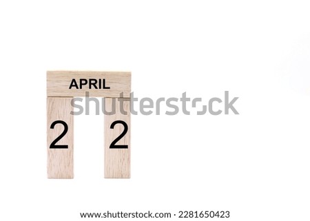 April 31 displayed wooden letter blocks on white background with space for print. Concept for calendar, reminder, date. 