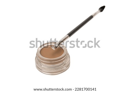 A brow pomade in blonde shade with brush isolated on a white background. Make up.  Royalty-Free Stock Photo #2281700141