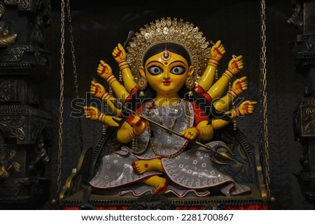 Durga puja background image. Sculpture of maa durga or maha kali or adi parashakti or bhabani taken at a barowari home based pooja occassion in west bengal. Royalty-Free Stock Photo #2281700867