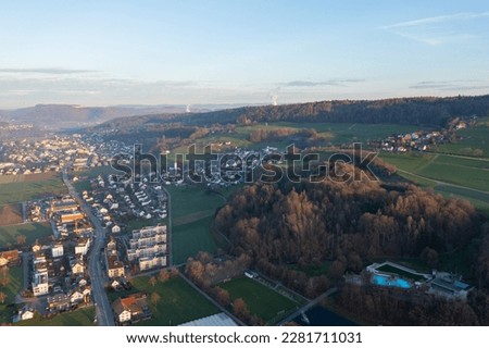 Beautiful view of the sunny slope of Obersiggenthal in the canton of Aargau in Switzerland during a beautiful sunrise.