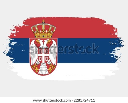 Artistic grunge brush flag of Serbia isolated on white background. Elegant texture of national country flag