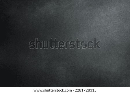 Monochrome black and graphite photo background. Free space for text. Top view.