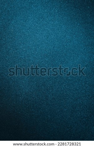 Dark textured black and blue background. Free space for text. Top view.