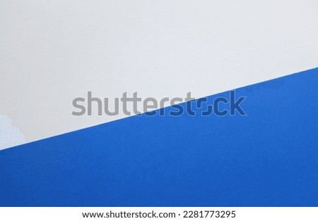 two tone blue white paper color for background. 
Two color paper with Overlay on the floor And split half of the image. background.Top view with place for text Royalty-Free Stock Photo #2281773295