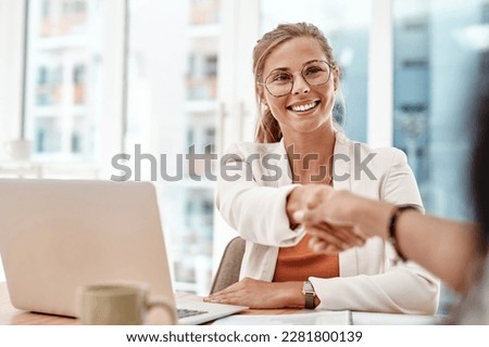 Thanks for joining. an attractive young businesswoman shaking hands with an unrecognizable colleague during a meeting in the boardroom. Royalty-Free Stock Photo #2281800139