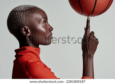 Embrace your talent, itll take you to the top. Studio shot of an attractive young woman playing basketball against a grey background.