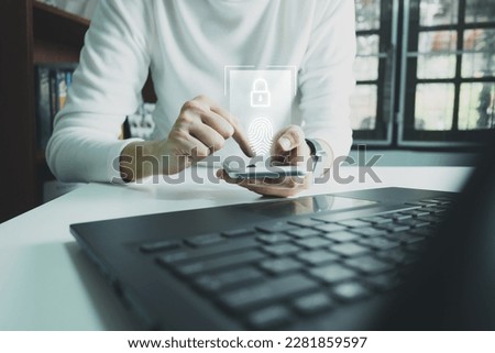 Verification of information with finger print by smart phone, Internet security, online financial transaction, 2-step verification, confirm transaction and identity. Royalty-Free Stock Photo #2281859597