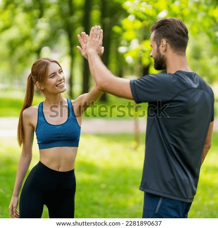 Square image of happy smiling couple giving highfive, high five hands gesture, woman with man or bearded coach trainer, clap palms, after successful training. Fitness, sport, outdoors workout concept.