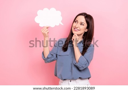 Photo of adorable lovely lady wear stylish clothes arm hold bubble shape look empty space isolated on pink color background