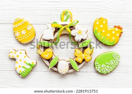 Easter gingerbread cookies wreath with bunny and eggs.