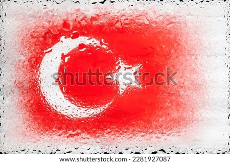 Turkey flag. Flag of Turkey on the background of water drops. Flag with raindrops. Splashes on glass. Abstract background