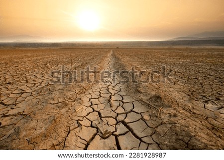 Canal middle agricultural dry by drought and heatwave on summer. water crisis and water stress on summer during long term drought on summer. Royalty-Free Stock Photo #2281928987