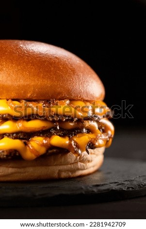triple smashburger smash burger with cheddar and onion Royalty-Free Stock Photo #2281942709
