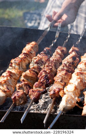Picture of meat cooking on barbeque grill