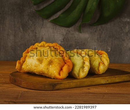 homemade traditional south american empanadas Royalty-Free Stock Photo #2281989397