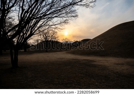 Sunset at Daereungwon Tomb Complex in Gyeongju, South Korea