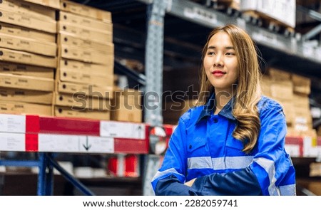 Portrait engineer asian woman shipping order export and import check goods and supplies,goods,factory,warehouse,international trade,transportation,cargo ship,logistic,distribution.business industry