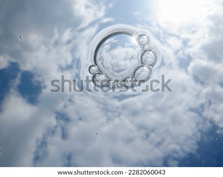 Underwater view of floating bubbles at Lake Simcoe during Summer