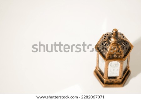 Clean Background with Islamic Vintage Lantern. The background can be used for presentations, greeting cards and social media posts.  Royalty-Free Stock Photo #2282067071