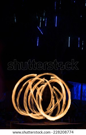 Amazing move of Fire dancing Show at night on Phi Phi Island, Thailand