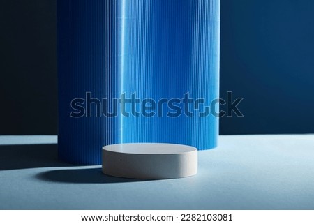 Minimal art background with white round empty podiums decorated on dark blue background. Copy space for cosmetics, business branding and product presentation