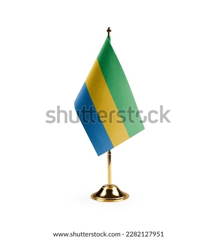 Small national flag of the Gabon on a white background. Royalty-Free Stock Photo #2282127951