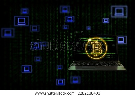 Notebook computer with bitcoin symbol and laptop icons on binary background